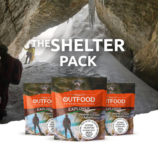 Tre confezioni Outfood Explorer arancioni e marroni con immagini di escursionisti, su sfondo di grotta di ghiaccio.