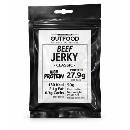 Bustina nera lucida di Outfood Beef Jerky Classic, 50g, con etichetta bianca che mostra 27.9g proteine, 130 Kcal.